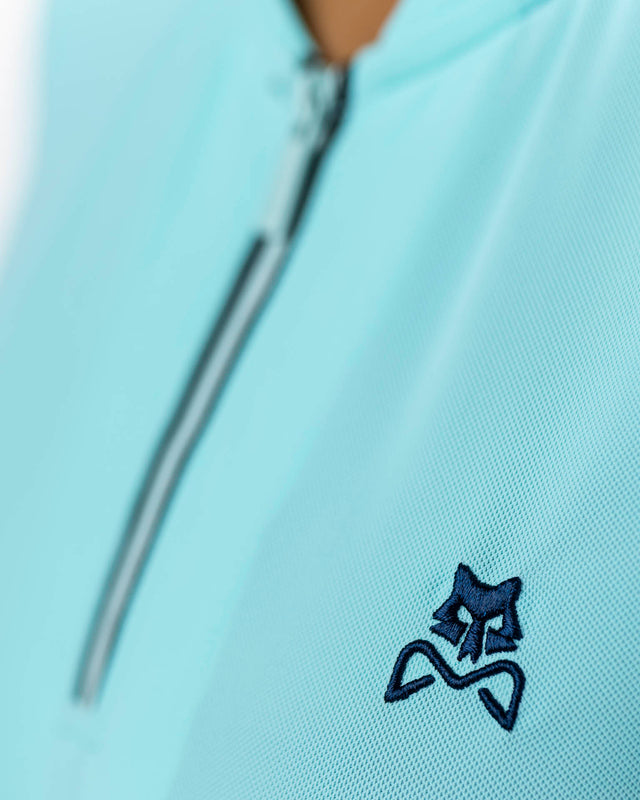 Polo de pádel turquesa WOW Zippy para mujer